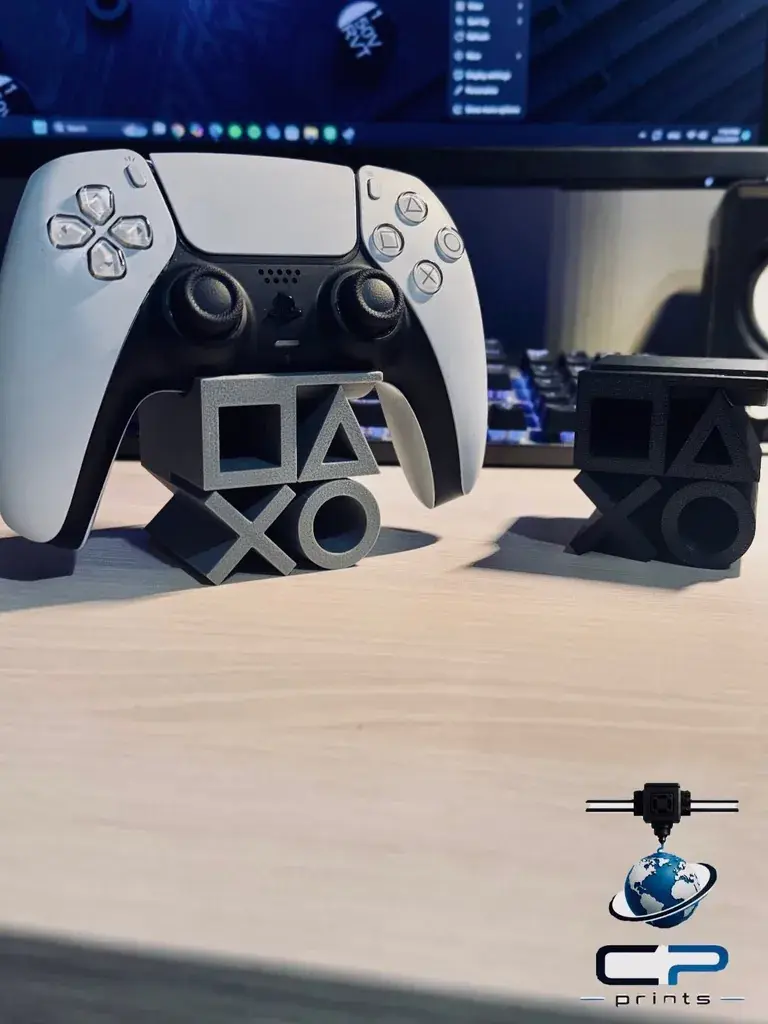 Χειριστήριο PlayStation επάνω σε βάση με τα σύμβολα τετράγωνο τρίγωνο Χ και κύκλο